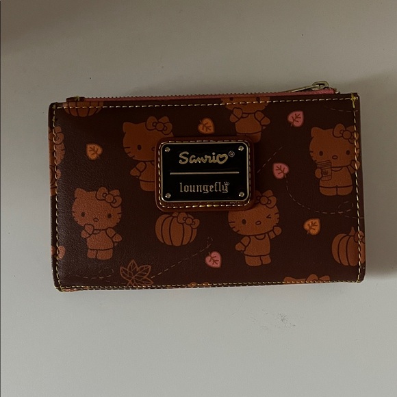 Sanrio Handbags - Sanrio x Loungefly Hello Kitty Pumpkin Spice All Over Print Flap Wallet